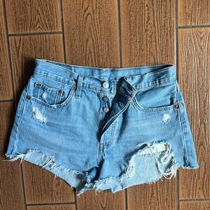 Distressed Levi’s denim shorts